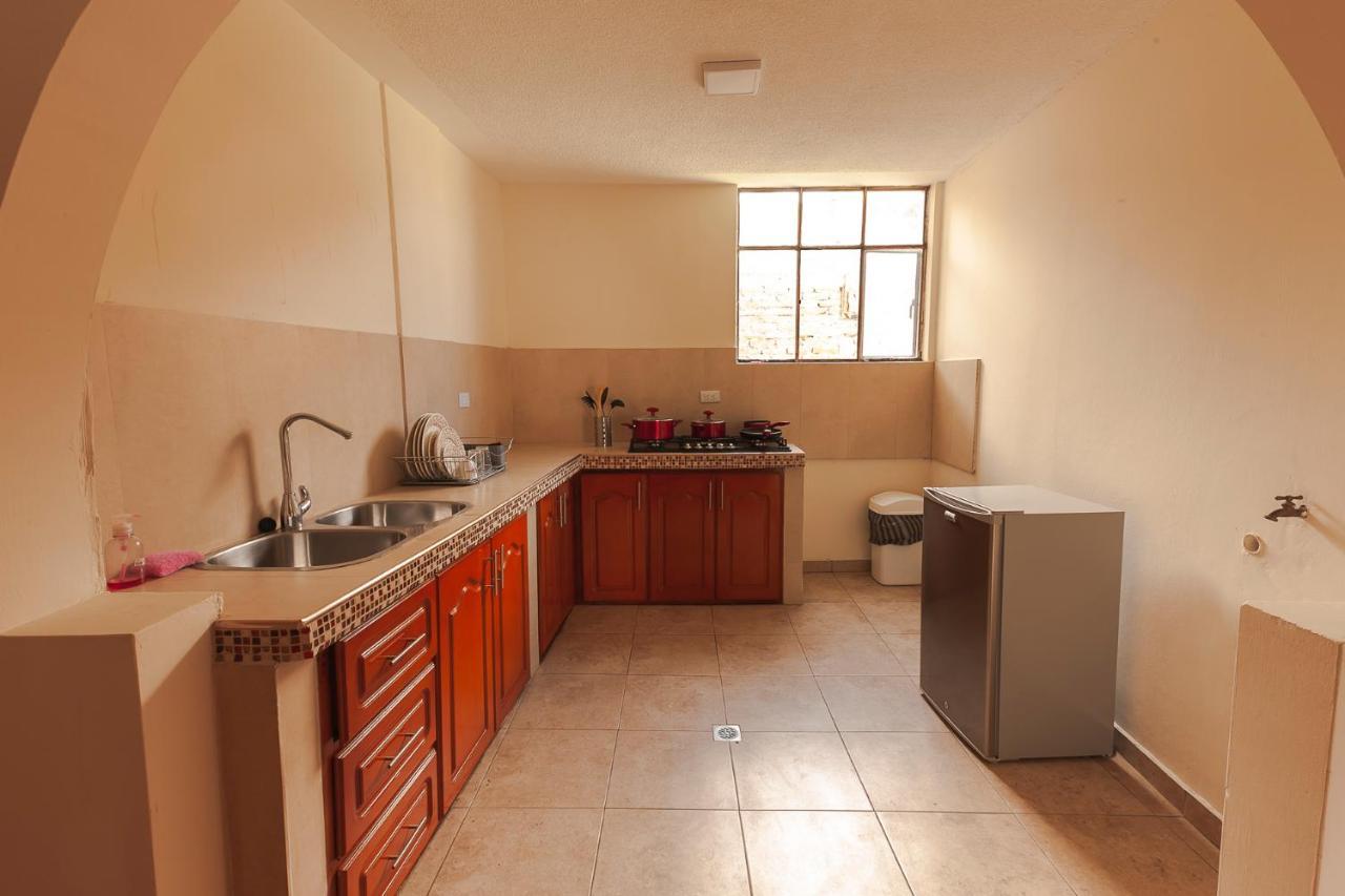 Los Ponchos Inn Apartasuite Otavalo Esterno foto