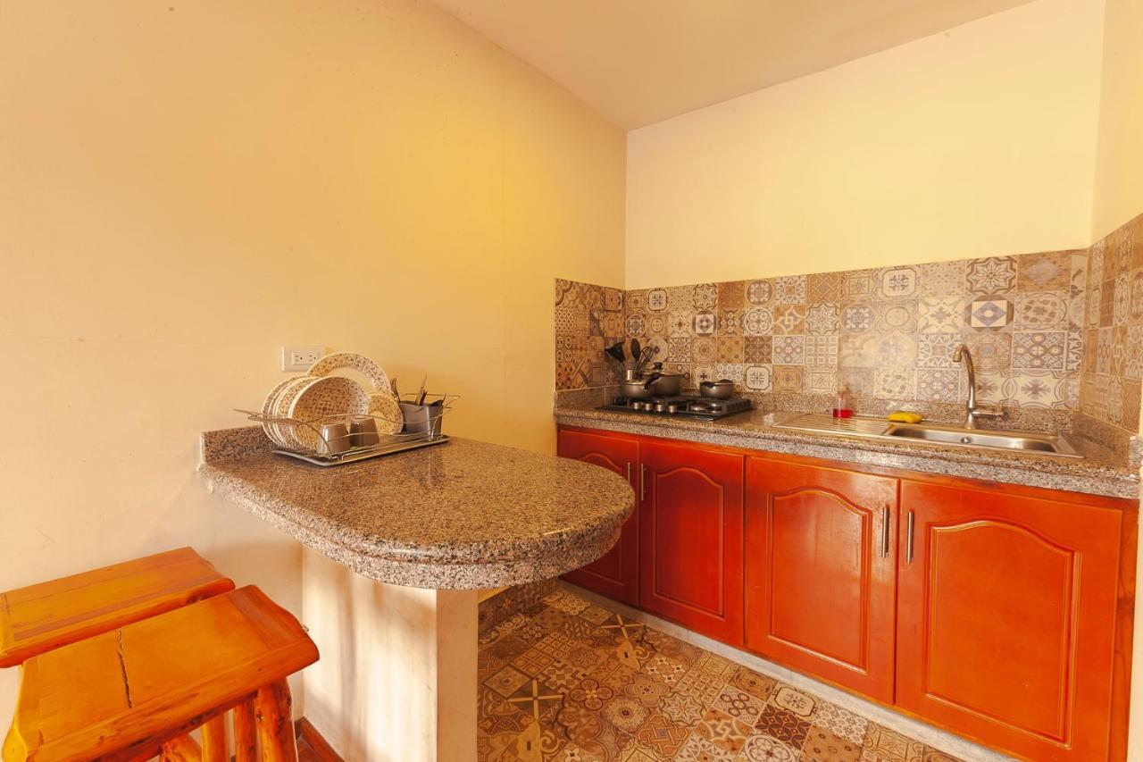 Los Ponchos Inn Apartasuite Otavalo Esterno foto